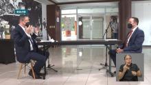 Fotografía de los candidatos a la presidencia Eliécer Feinzaig y Rodrigo Cháves, en el debate UCR.